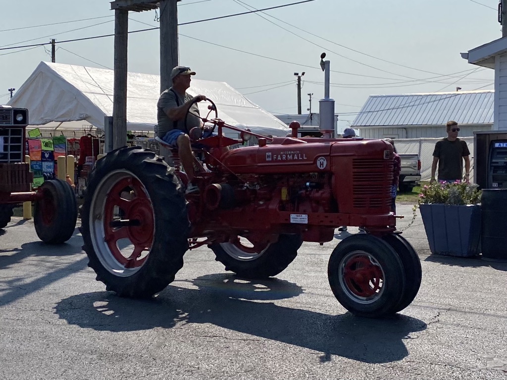 Antique tractor parade! I farmed with some of these tractors.